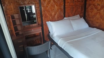 Desk, iron/ironing board, bed sheets