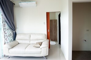 Standaard kamer | Woonruimte | Flatscreentelevisie
