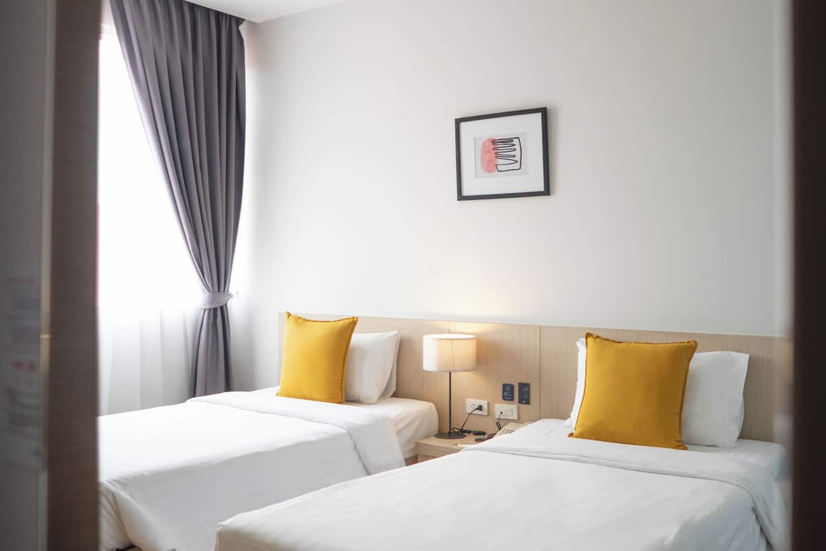 Superior Twin kamer | Een minibar, een kluis op de kamer, verduisterende gordijnen