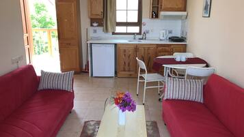 Family Apartment, 1 Bedroom | Living area | LED TV