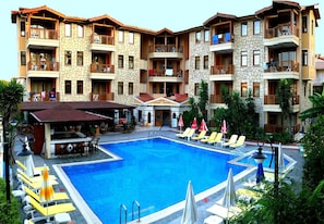 Outdoor pool, pool umbrellas, pool loungers