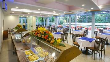 Breakfast, lunch, dinner served; local cuisine