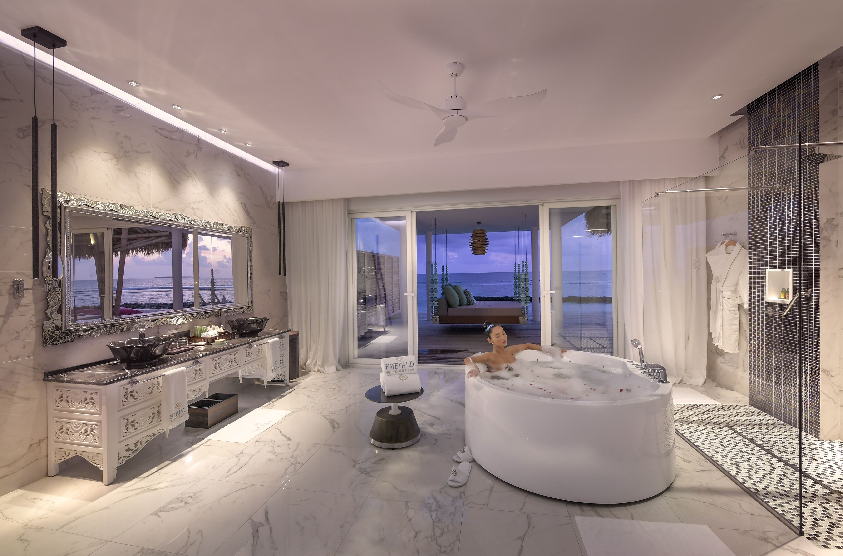 Superior Water Villa with Pool | Bathroom | Separate tub and shower, deep soaking tub, rainfall showerhead