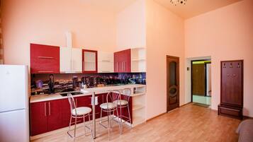 Fridge, microwave, stovetop, coffee/tea maker