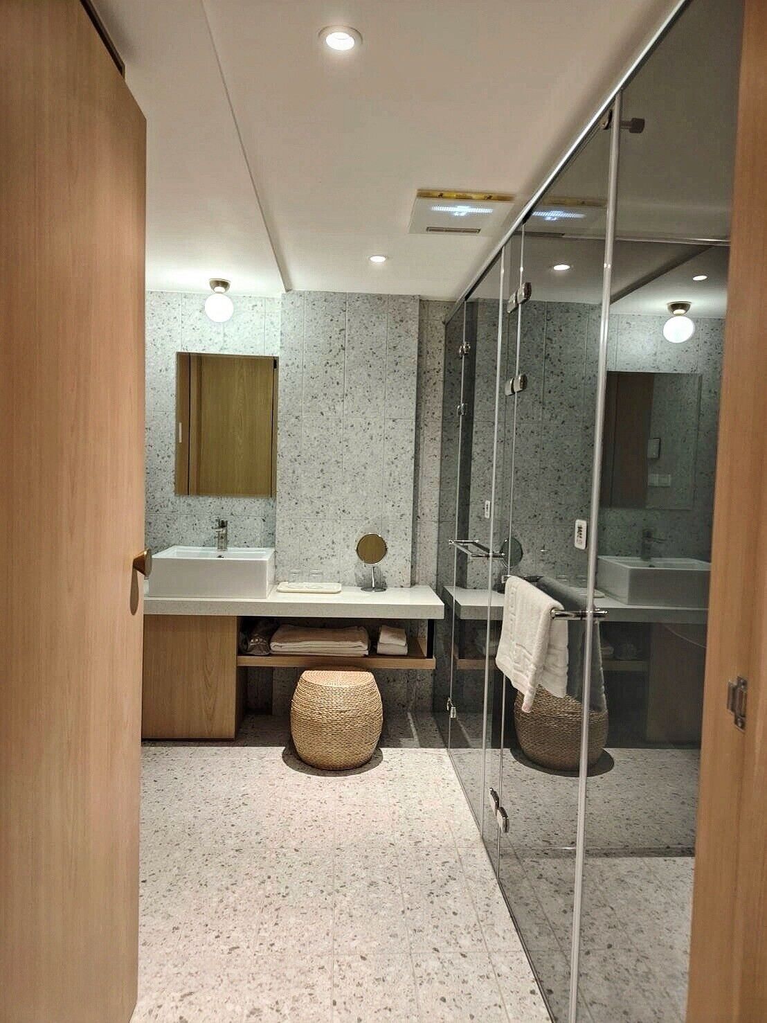 new deluxe double room | bathroom | rainfall showerhead, free toiletries, hair dryer, slippers