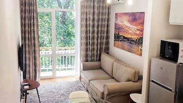 Standard Apartment, 1 Bedroom, Smoking | Living area | Smart TV, Netflix, pay movies, streaming services