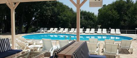 Outdoor pool, pool umbrellas, sun loungers