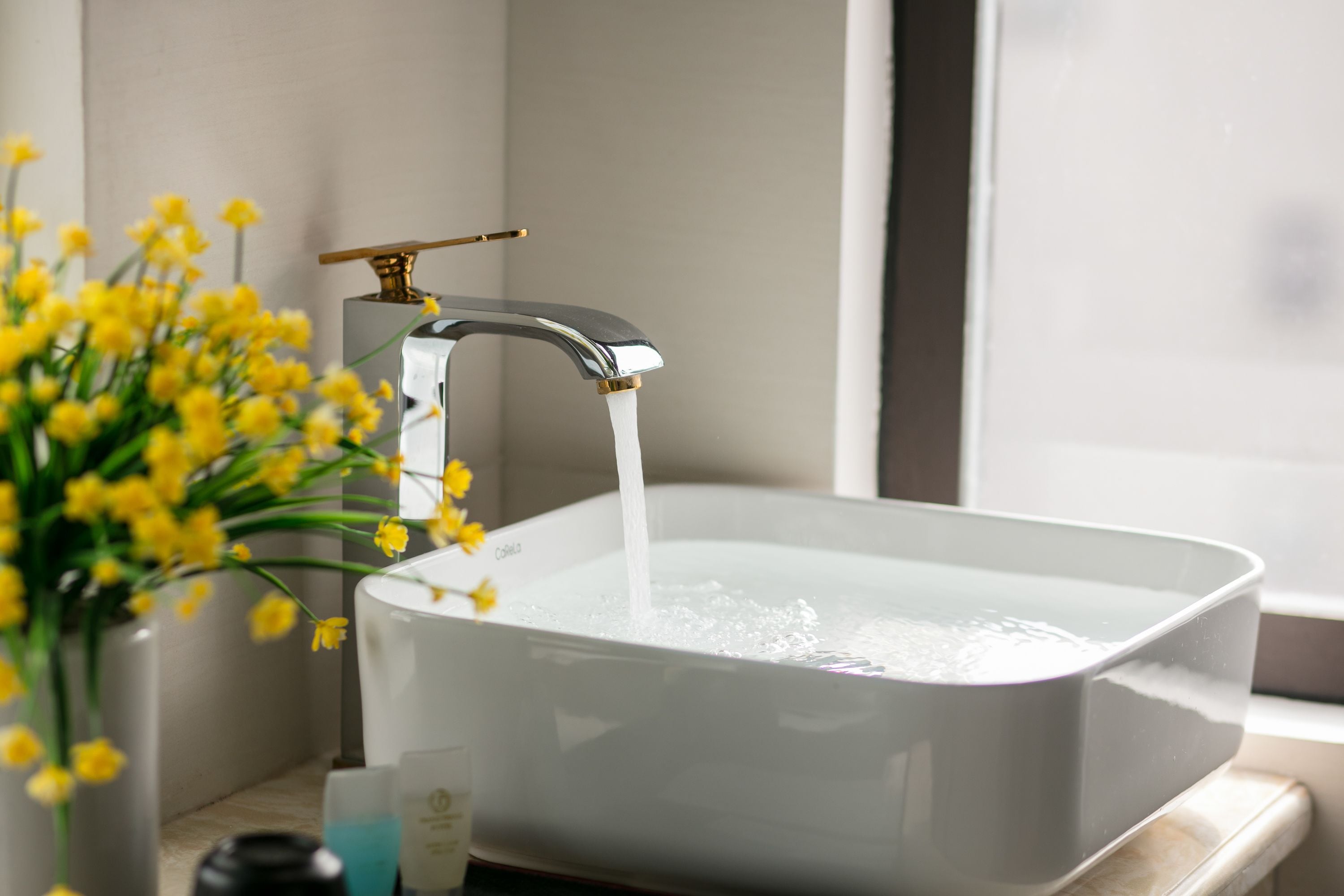 deluxe double room, 1 queen bed, non smoking, lake view | bathroom | shower, rainfall showerhead, designer toiletries, hair dryer