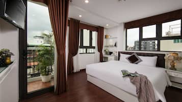 Ropa de cama de alta calidad, cubrecamas y minibar