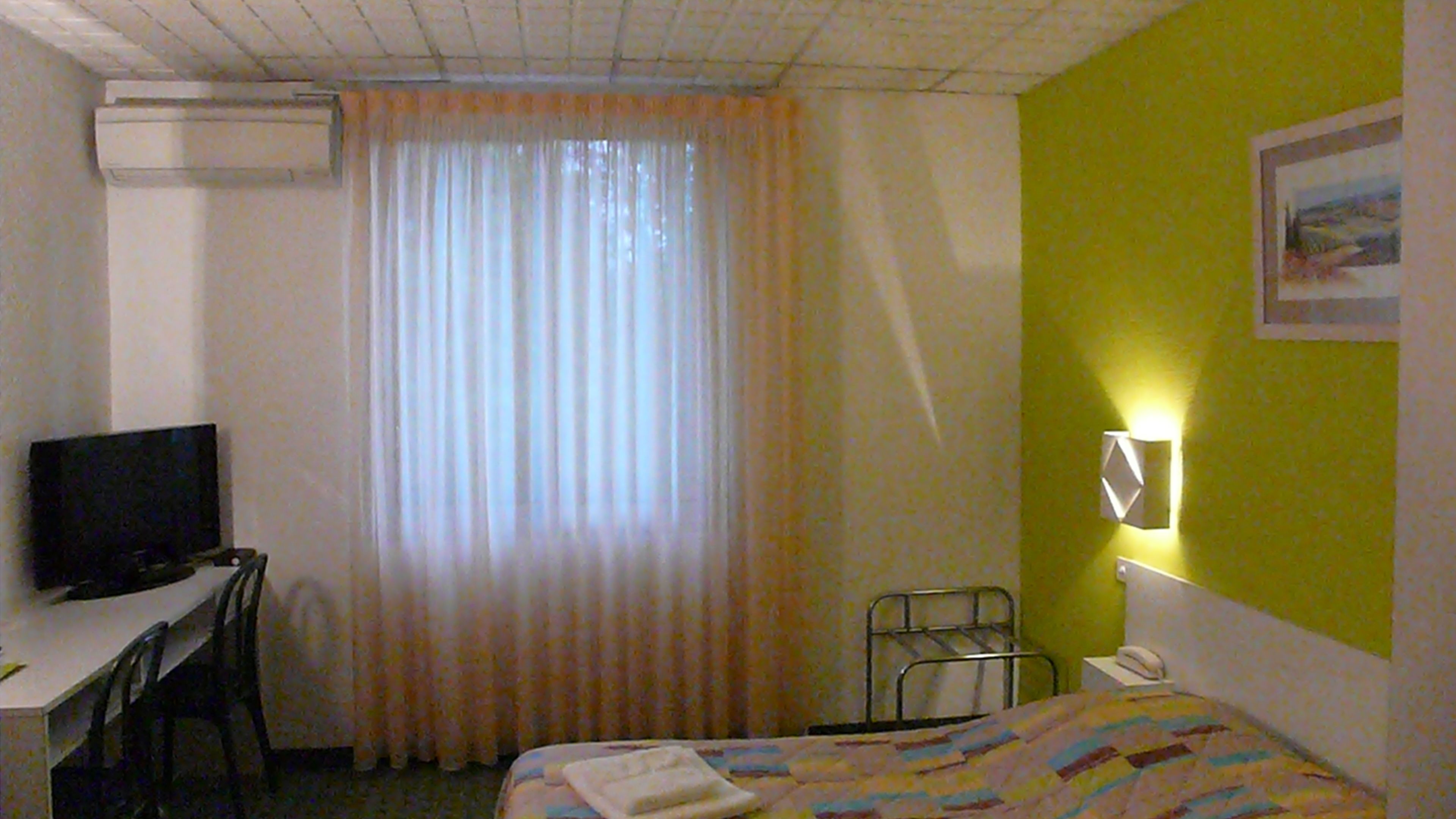 Desk, free WiFi, bed sheets