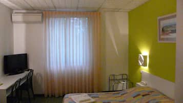 Desk, free WiFi, bed sheets