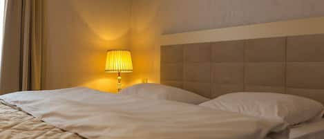 Premium bedding, desk, soundproofing, iron/ironing board