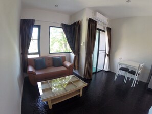 Apartemen Grand, 1 Tempat Tidur King | Area keluarga | TV layar datar