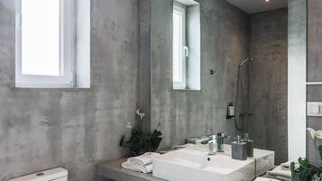 Superior Apartment, Sea View | Bathroom | Shower, designer toiletries, hair dryer, bathrobes