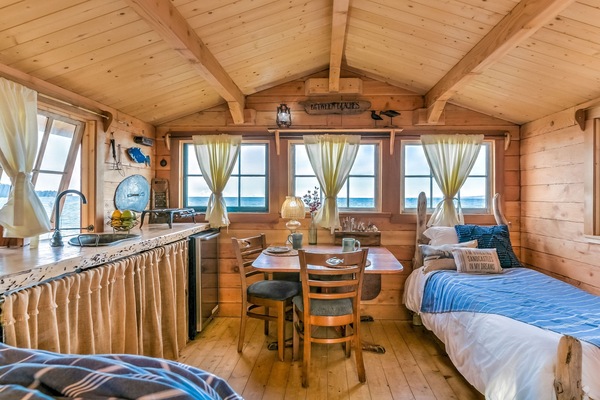 Endless views out every window! Our well-appointed cabins are cozy & warm.