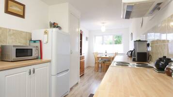 Fridge, microwave, dishwasher, coffee/tea maker