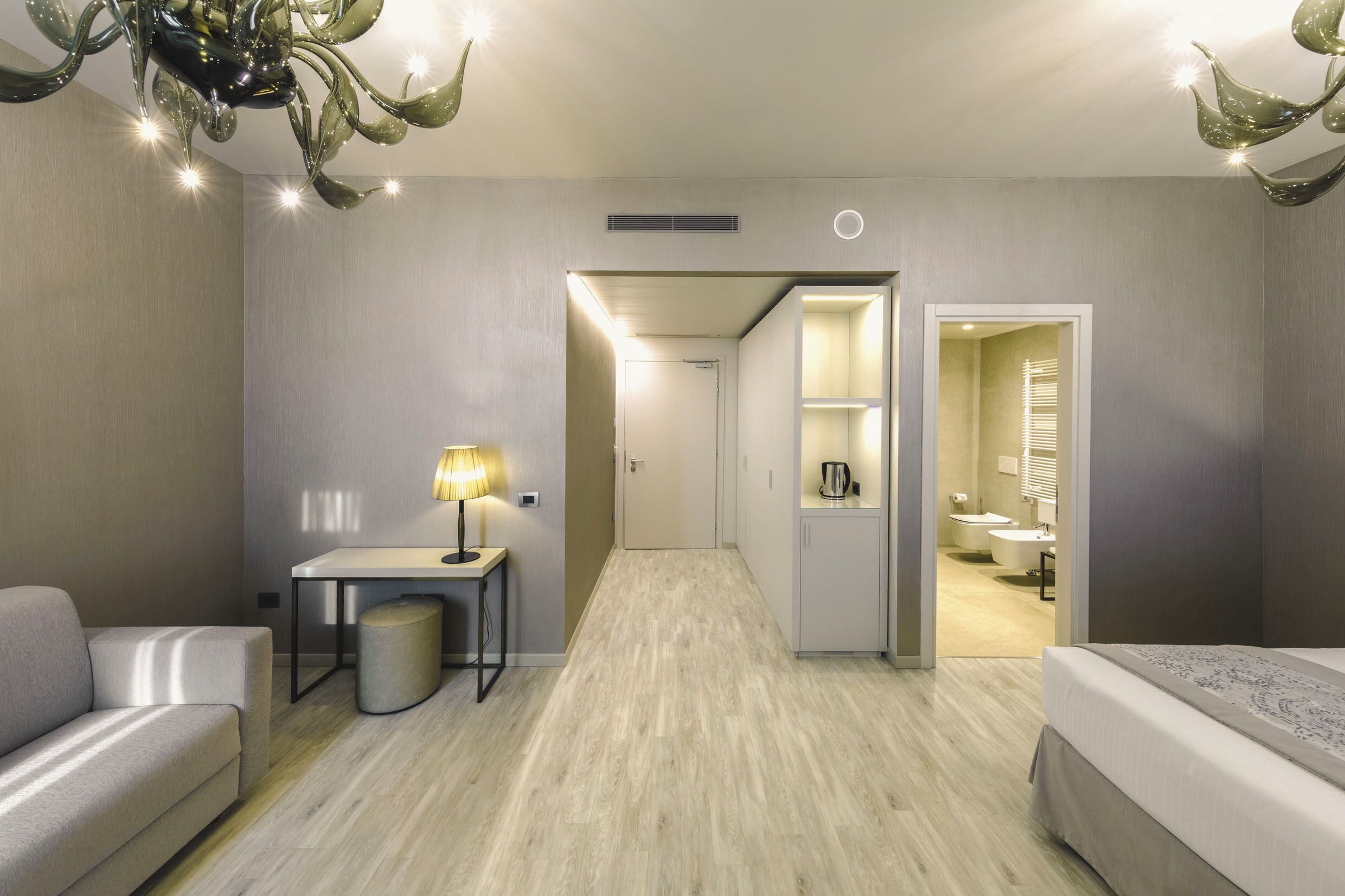 junior suite | 1 bedroom, in-room safe, desk, blackout curtains