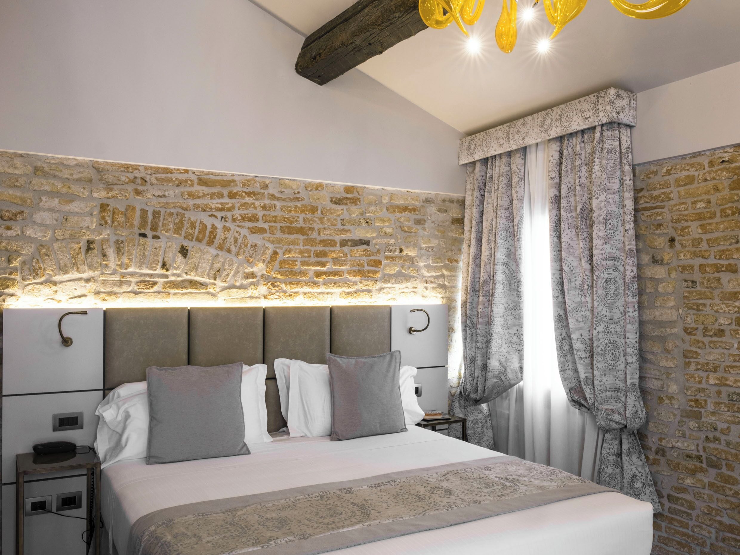 junior suite | 1 bedroom, in-room safe, desk, blackout curtains