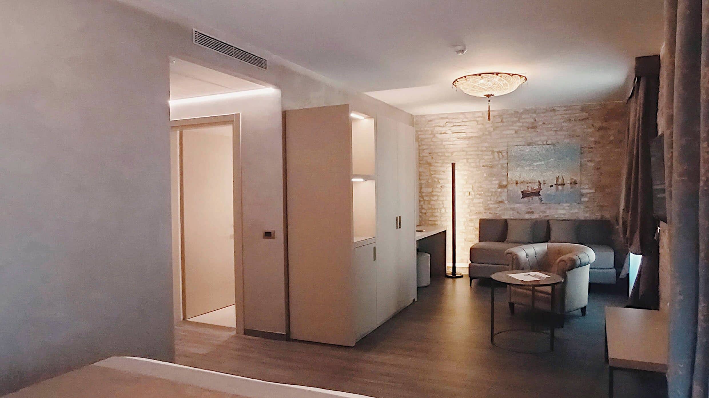 junior suite | 1 bedroom, in-room safe, desk, blackout curtains