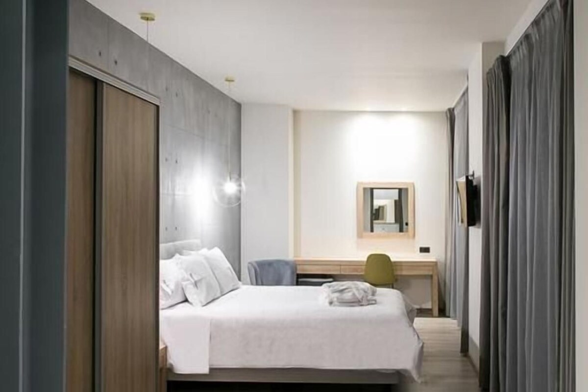 In-room safe, desk, laptop workspace, blackout curtains