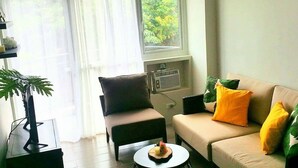 1 Bedroom Apartment | Living area | Flat-screen TV - 3B Cluster C Oceanway Residences (Boracay Island)