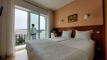 Economy Twin Room, Balcony | 18 bedrooms, premium bedding, desk, laptop workspace