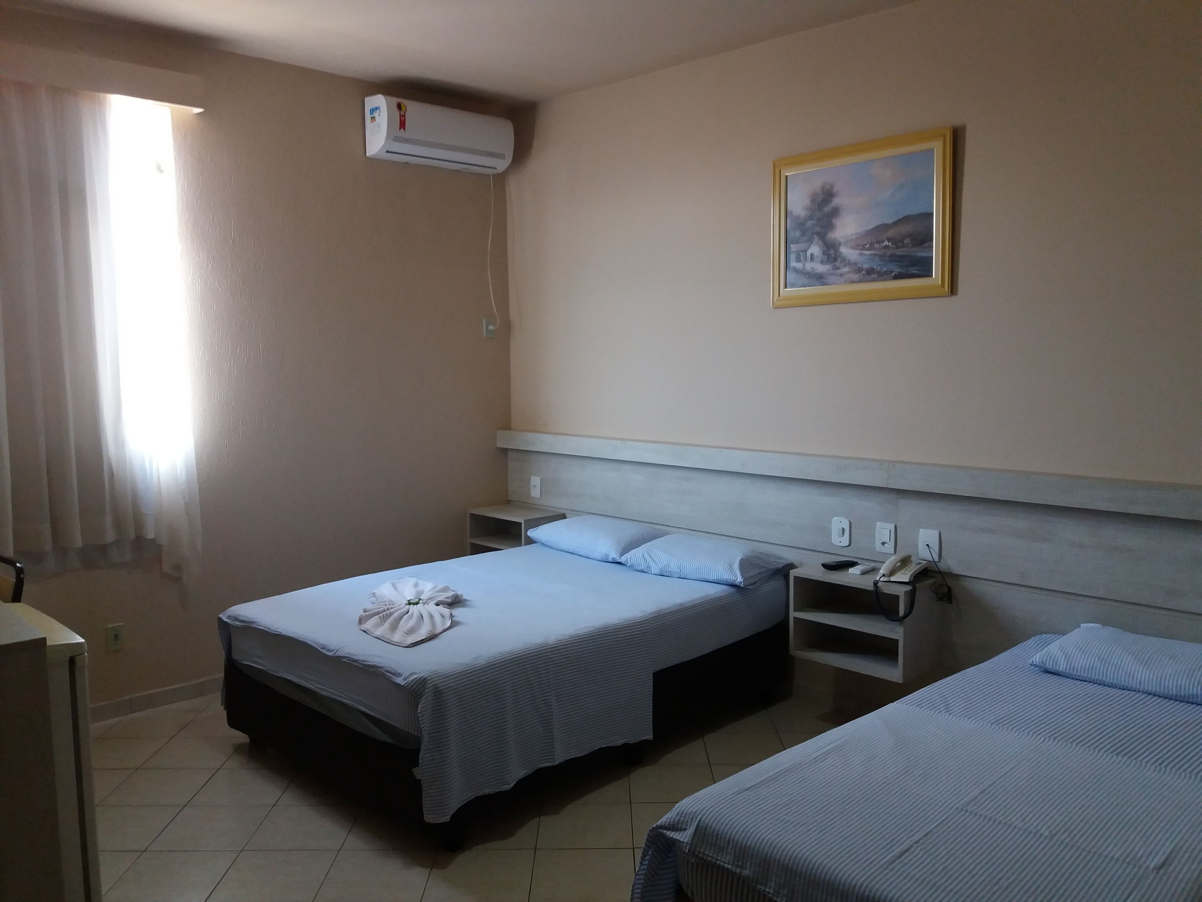 triple room | minibar, desk, blackout curtains, iron/ironing board