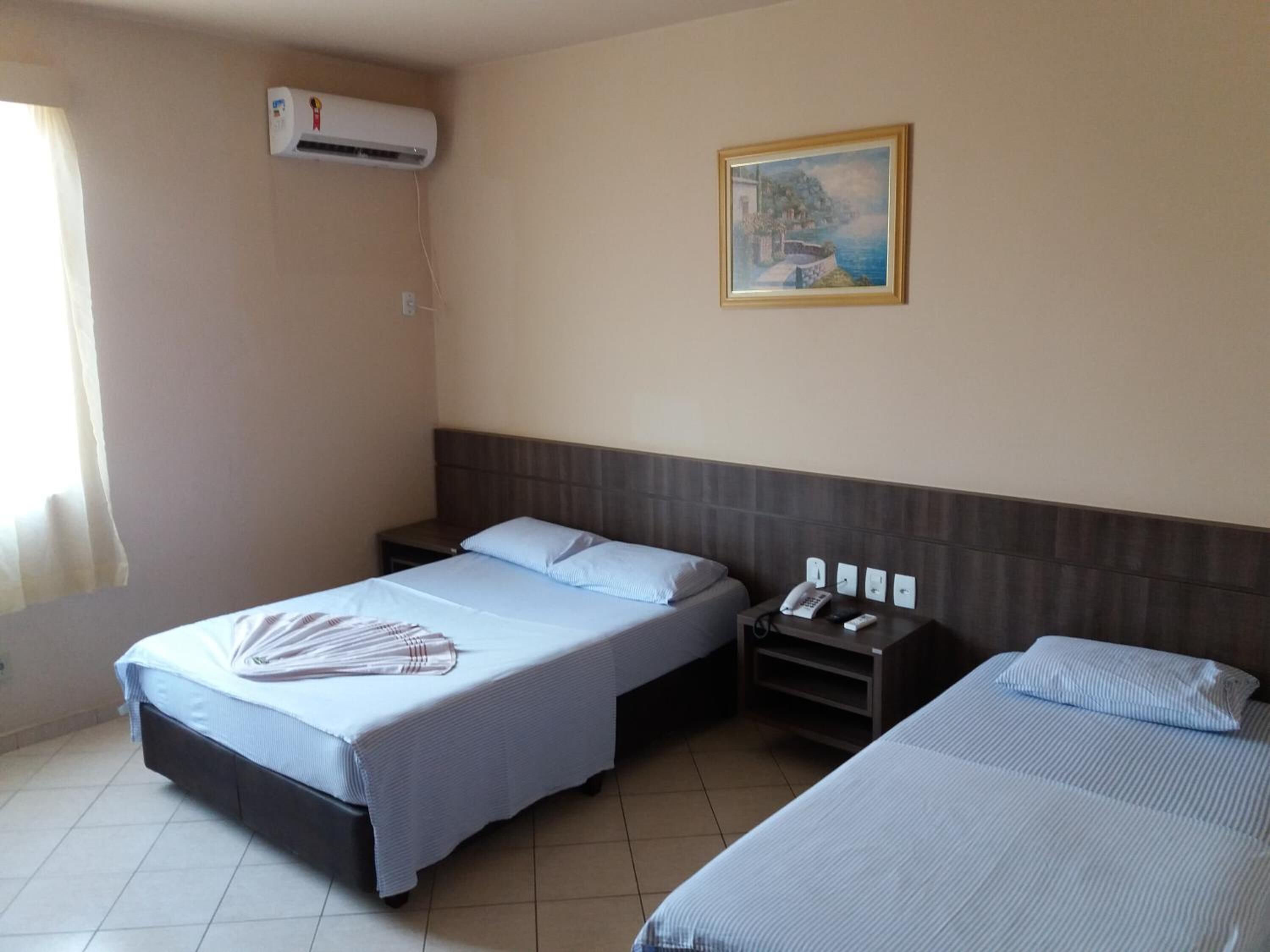 minibar, desk, blackout curtains, iron/ironing board