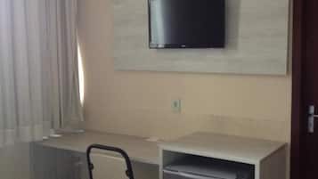 Minibar, desk, blackout curtains, iron/ironing board
