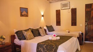 Standard Triple Room | Minibar, in-room safe, blackout curtains