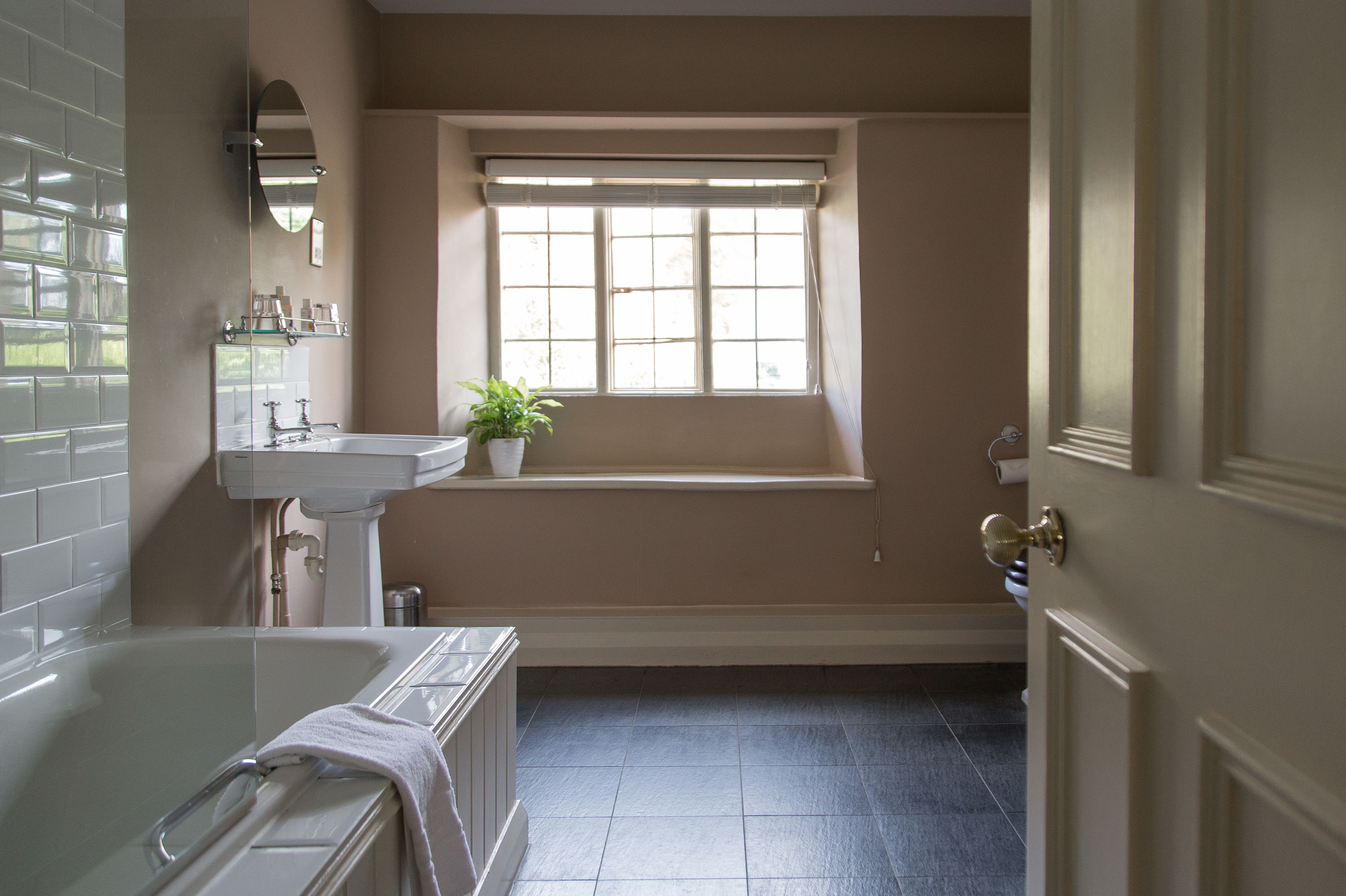 comfort room | bathroom | combined shower/bathtub, designer toiletries, hair dryer, towels