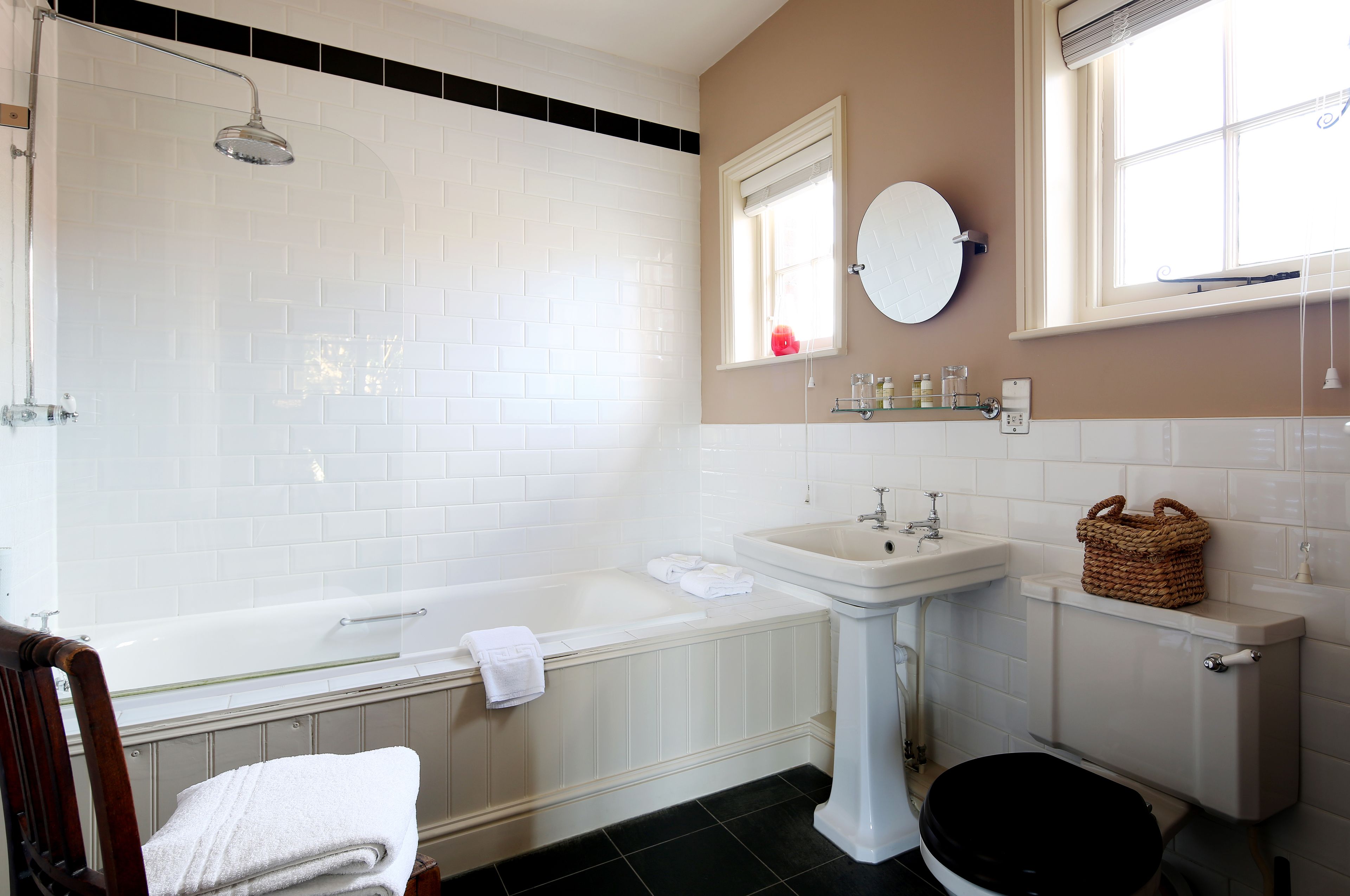 combined shower/bathtub, designer toiletries, hair dryer, towels