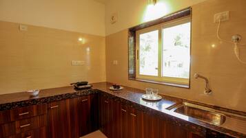 Double or Twin Room | Private kitchenette | Fridge, cookware/dishes/utensils, dining tables