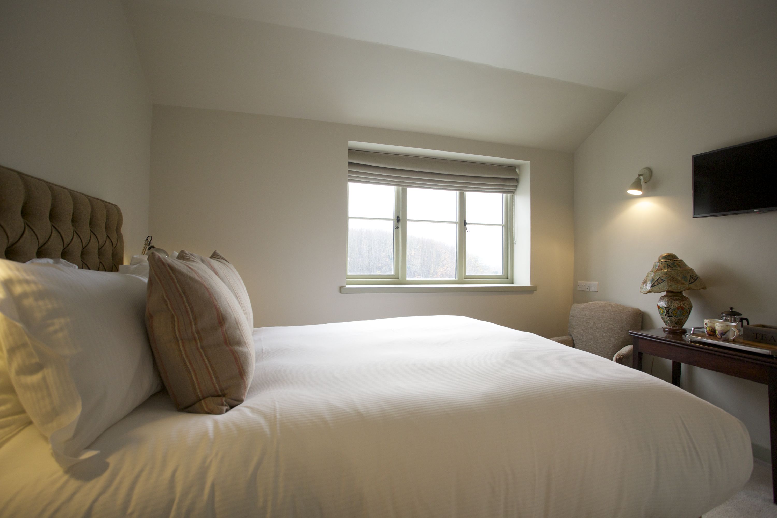 classic room | egyptian cotton sheets, premium bedding, down duvets, iron/ironing board