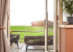 Quarto com design assinado | Terraço/pátio