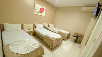 Executive Triple Room | Minibar, desk, free cots/infant beds, free WiFi