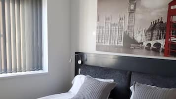 Literie de qualité supérieure, minibar, décoration personnalisée