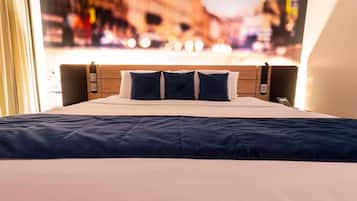 Pillowtop beds, minibar, in-room safe, desk