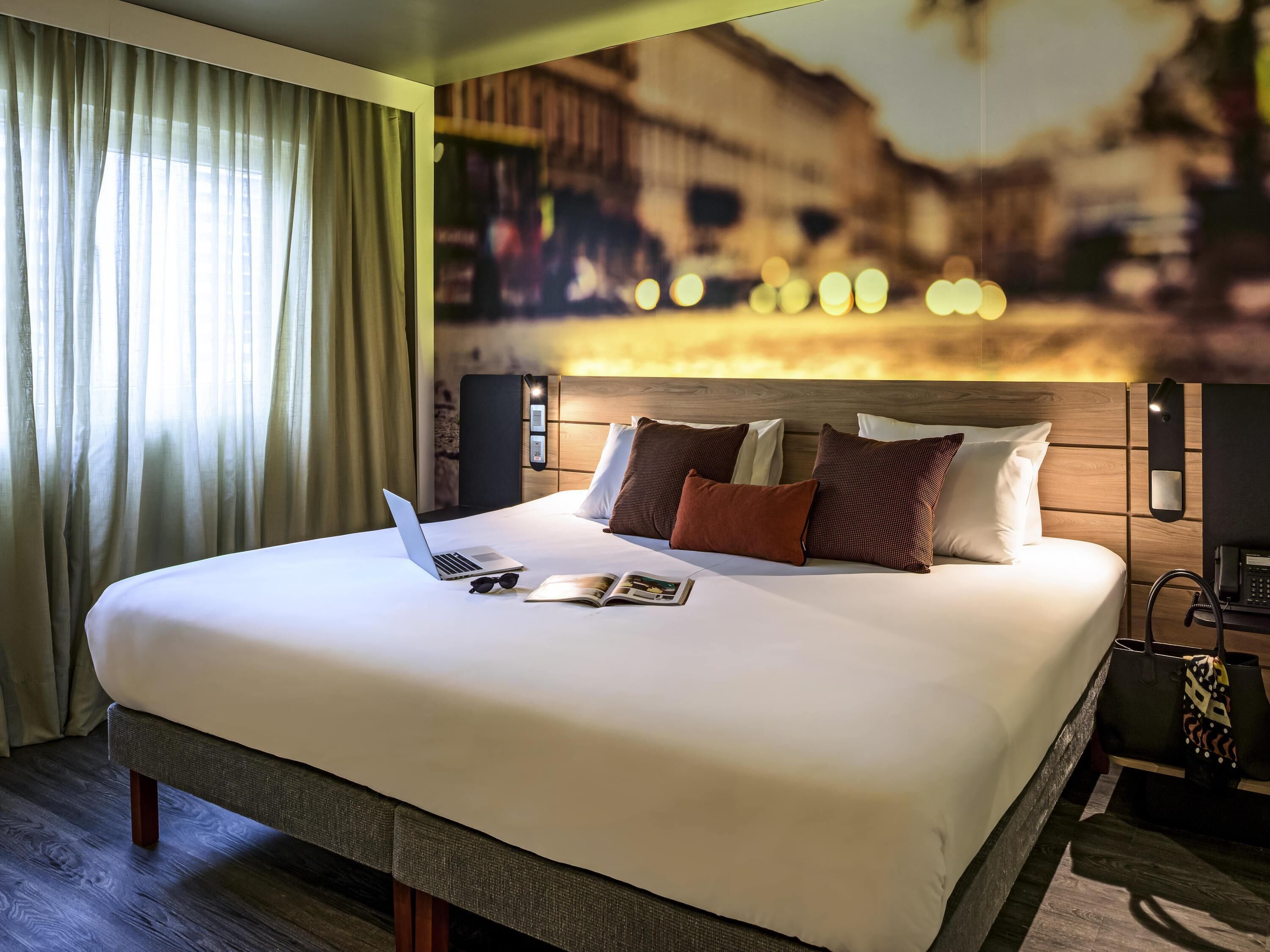 Colchones con pillow-top, minibar y caja de seguridad en la habitación 