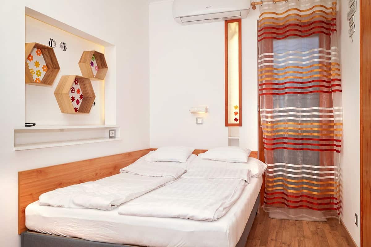 Design appartement, 1 slaapkamer | Een bureau, gratis wifi, beddengoed
