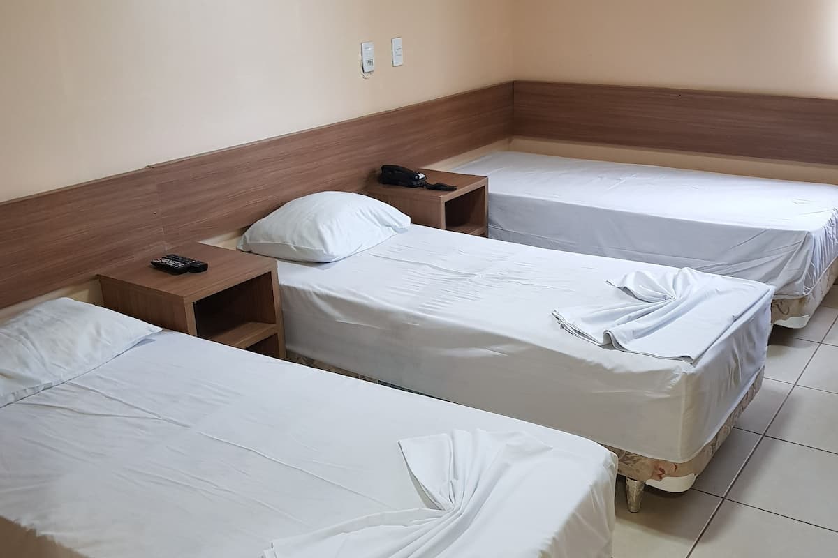 Standard Triple Room | Minibar, desk, iron/ironing board, free WiFi