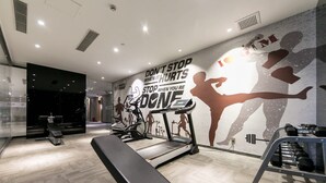 A modern gym with treadmills, stationary bikes, and a bench press. - Ibis Styles Shanghai Hongqiao Airport (Shanghai)