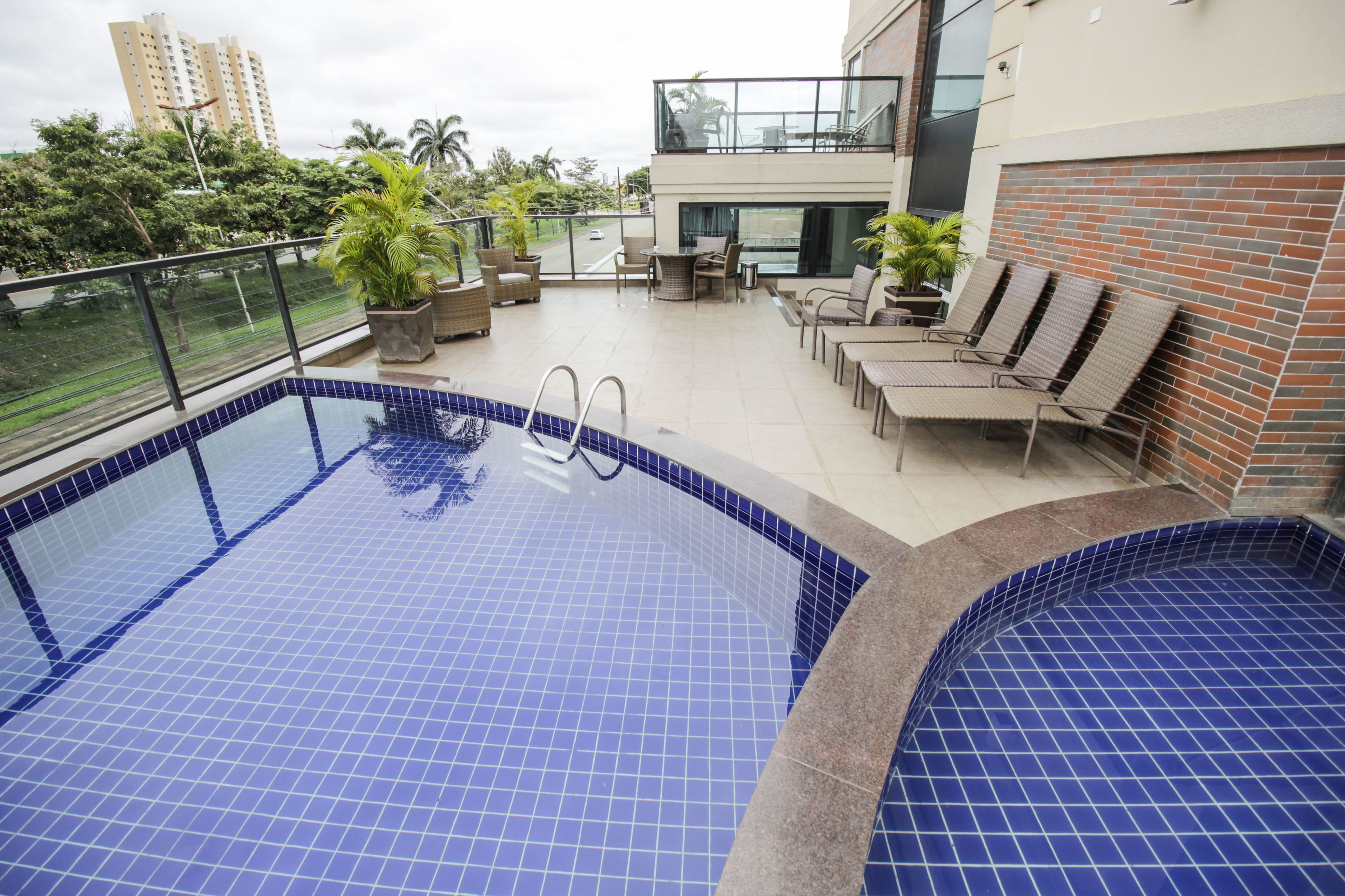 Outdoor pool, pool umbrellas, sun loungers