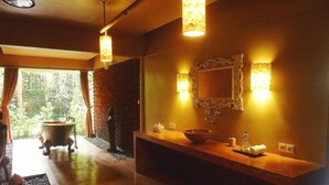 Deluxe Suite | Bathroom | Separate tub and shower, deep soaking tub - Ubud Suites (Ubud)