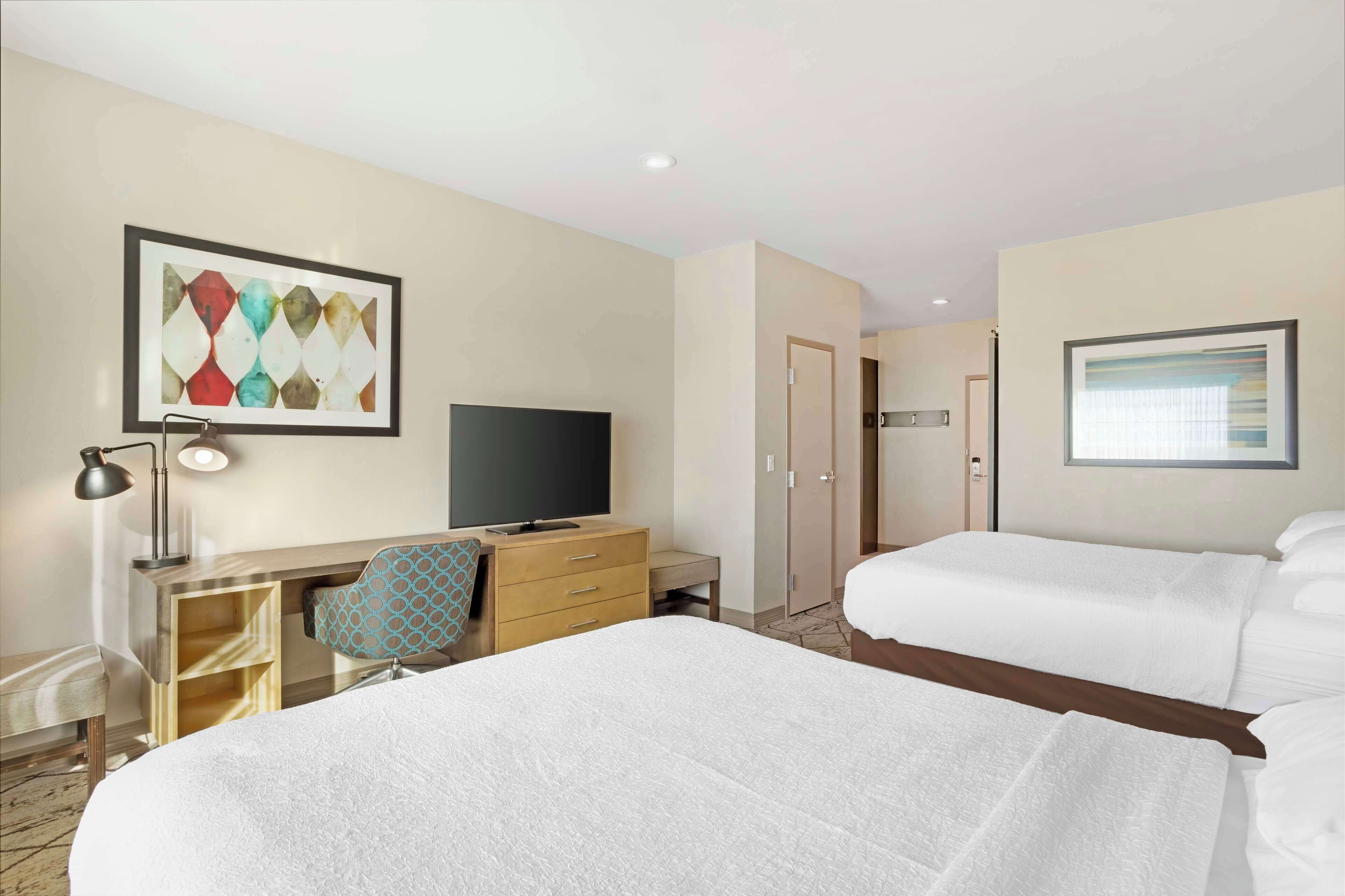 junior suite, 2 queen beds, non smoking, kitchenette | 1 bedroom, pillow-top beds, in-room safe, desk