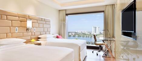 Premium bedding, down comforters, minibar, in-room safe