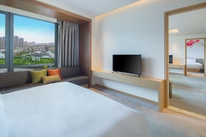 Deluxe Suite, 1 Bedroom | Premium bedding, minibar, in-room safe, individually decorated
