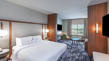 Escritorio, cortinas blackout, tabla de planchar con plancha y cunas