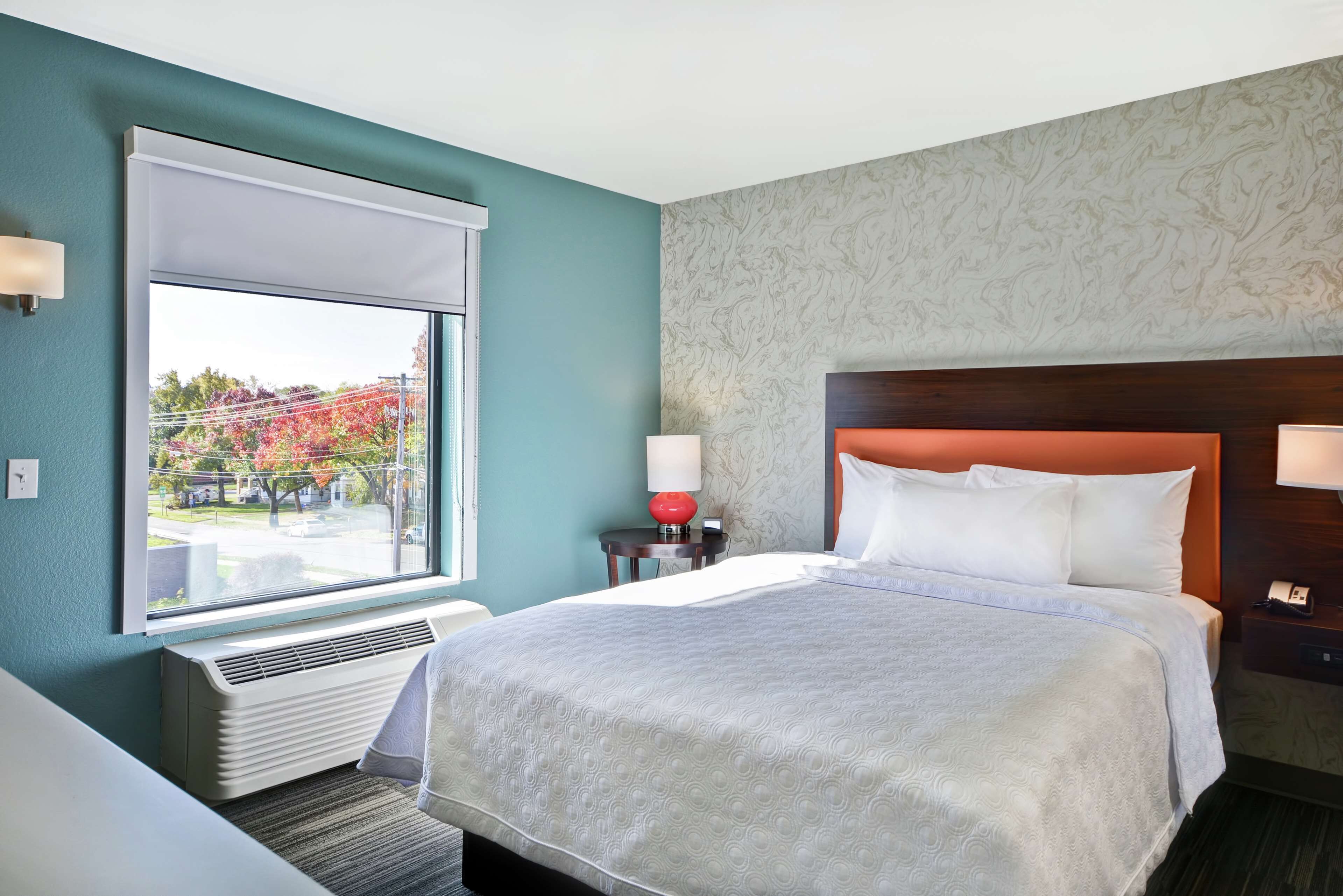 suite, 1 bedroom, non smoking | desk, blackout curtains, iron/ironing board, free wired internet