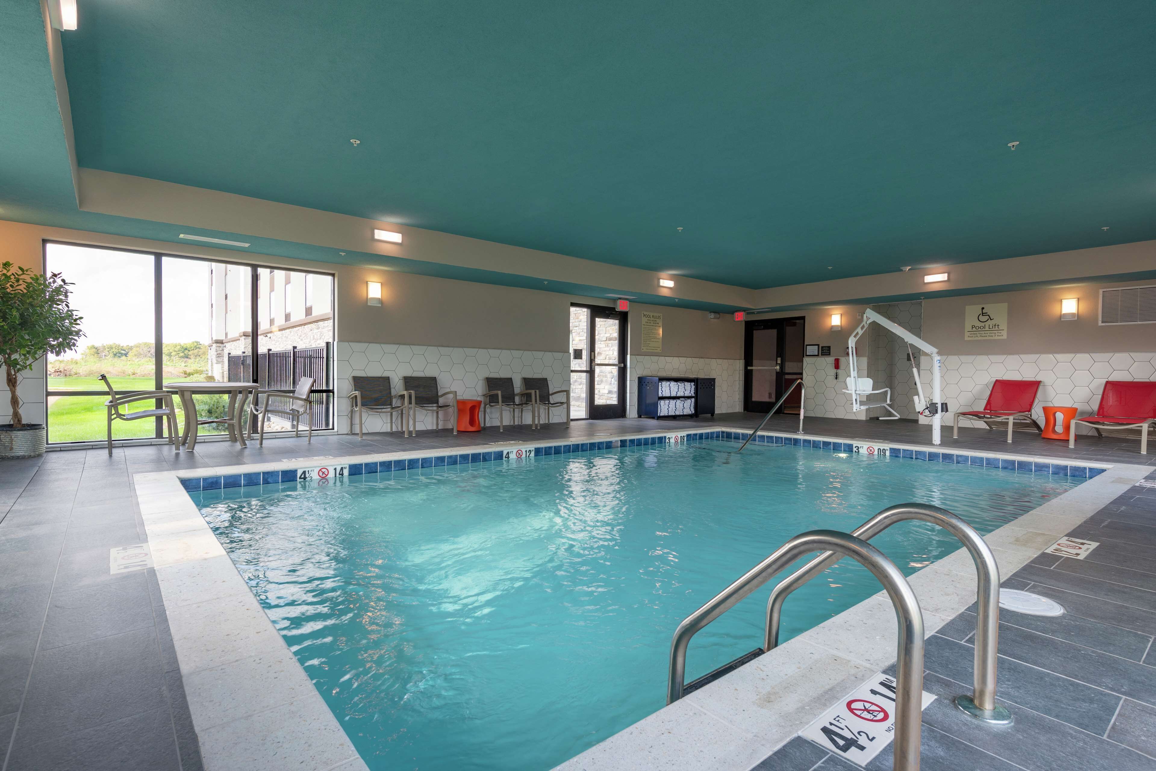 indoor pool, open 9:00 am to 10:00 pm, pool loungers